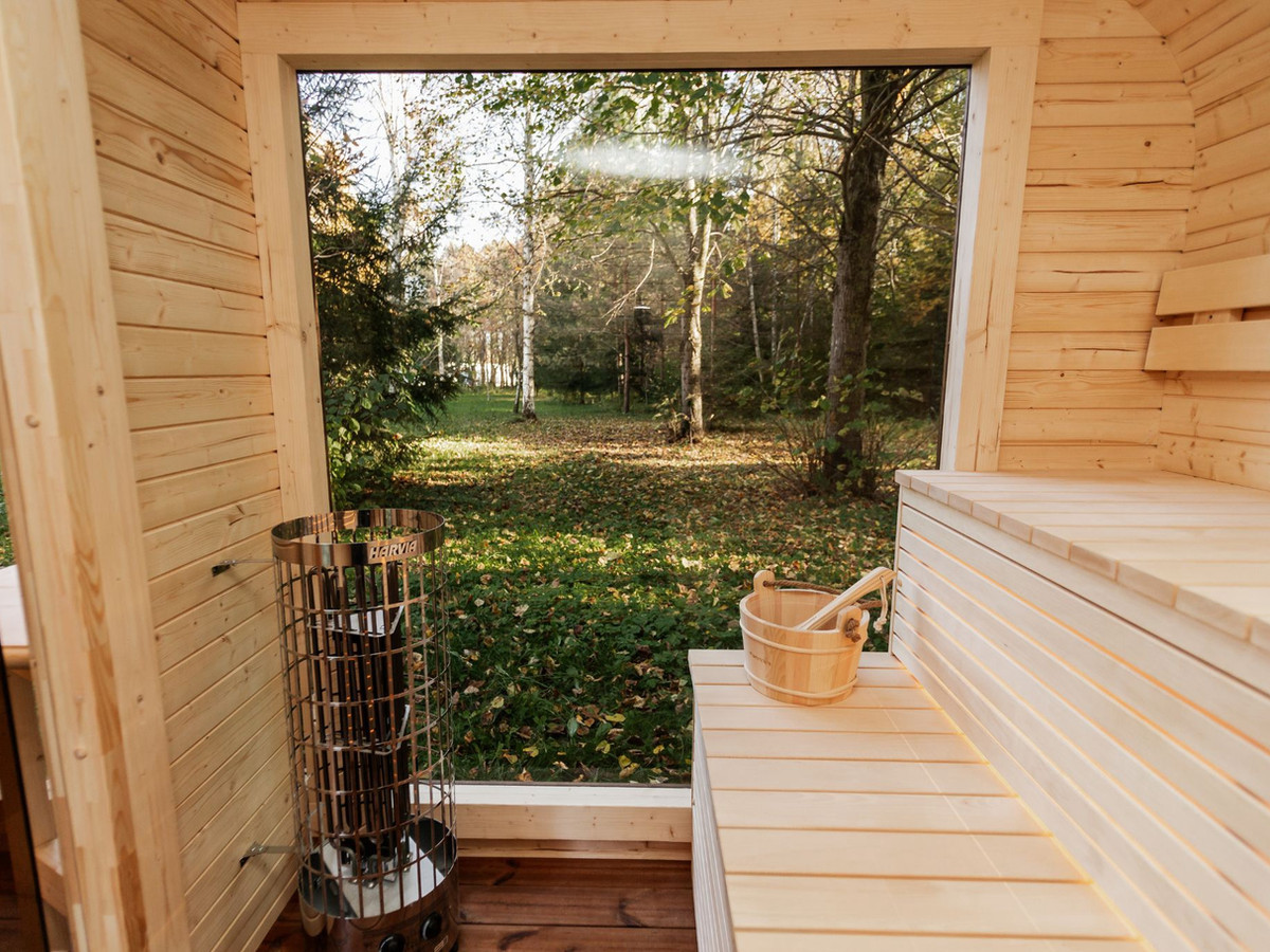 Luxury European sauna house in a backyard setting